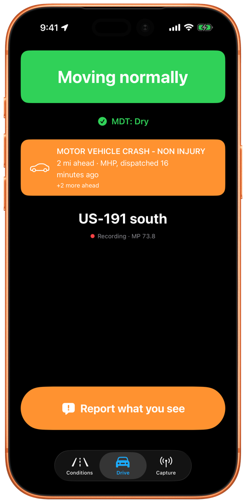 Drive screen mid-trip, showing a grade banner and a nearby incident alert